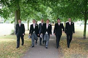 men in wedding outfits