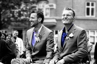 two men sitting together