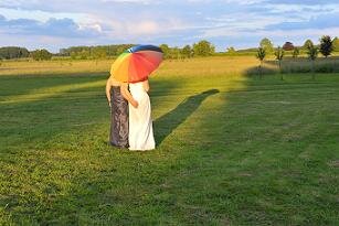 two women under umbrella