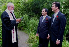 two guys being blessed