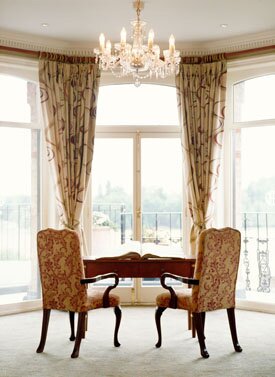 Chairs beside window