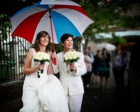 two women under umbrella
